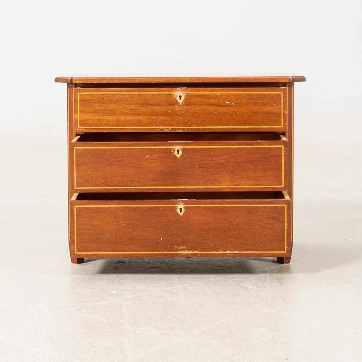 Miniature chest of drawers, early 20th century.