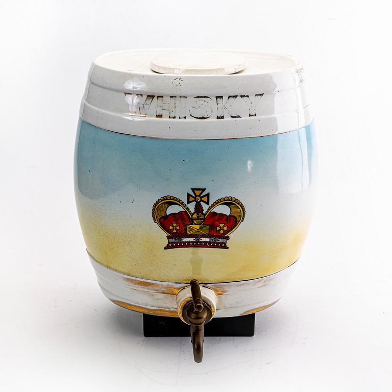 A porcelain whisky-barrel around 1900.