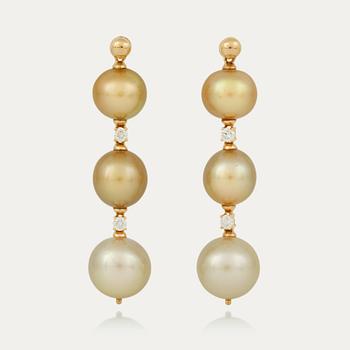 727. A pair of yellow toned cultured South Sea pearl and brilliant-cut diamond earrings.