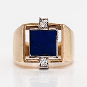 A 14K gold ring, diamonds totalling approximately 0.15 ct according to engraving and lapis lazuli.