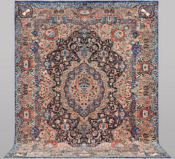 A Kashmar carpet, c. 392 x 296 cm.