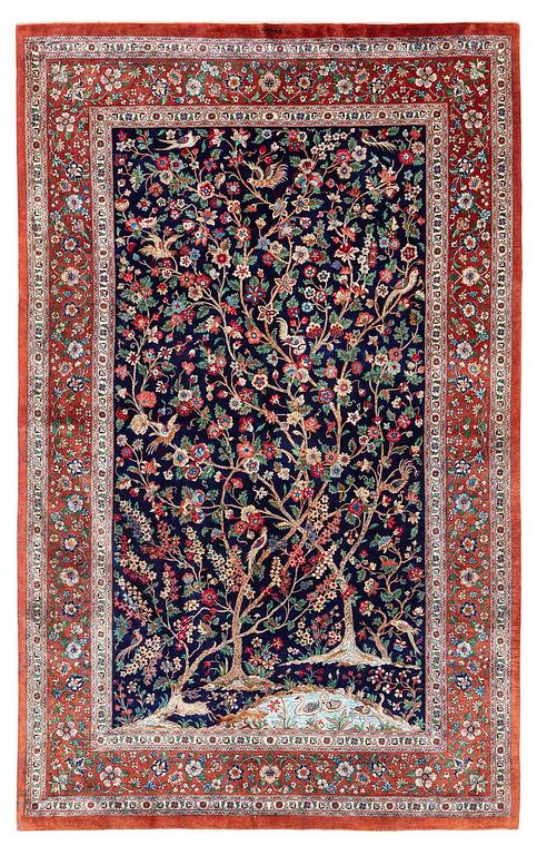 A signed pictoral silk Qum rug, c. 203 x 127 cm.