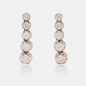 654. A pair of brilliant cut diamond earrings, total carat weight circa 3.75 cts.