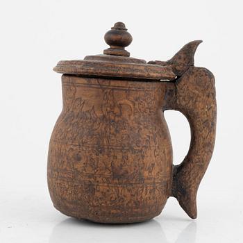 A birch tankard, dated 1830.