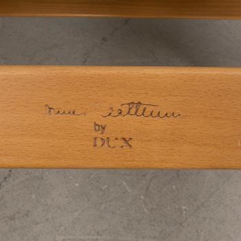 Bruno Mathsson, fåtöljer ett par med en fotpall, "Pernilla", Dux, 1900-talets slut.