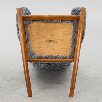 Gungstol, Nesto, Nässjö stolfabrik, modell 295, 1900-talets andra hälft, s.k. Kennedy-gungstol.