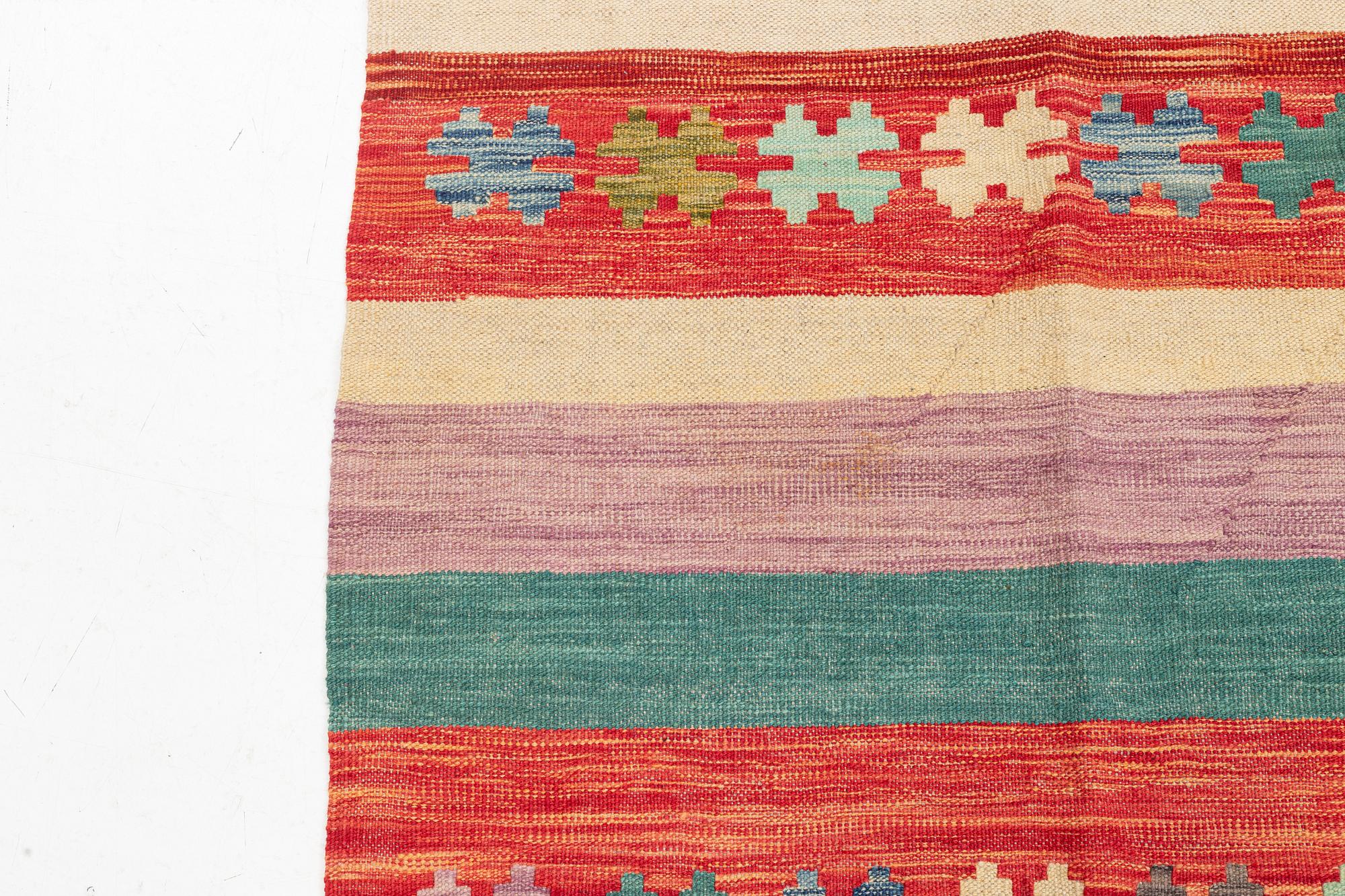 A kilim rug, ca 298 x 208 cm.