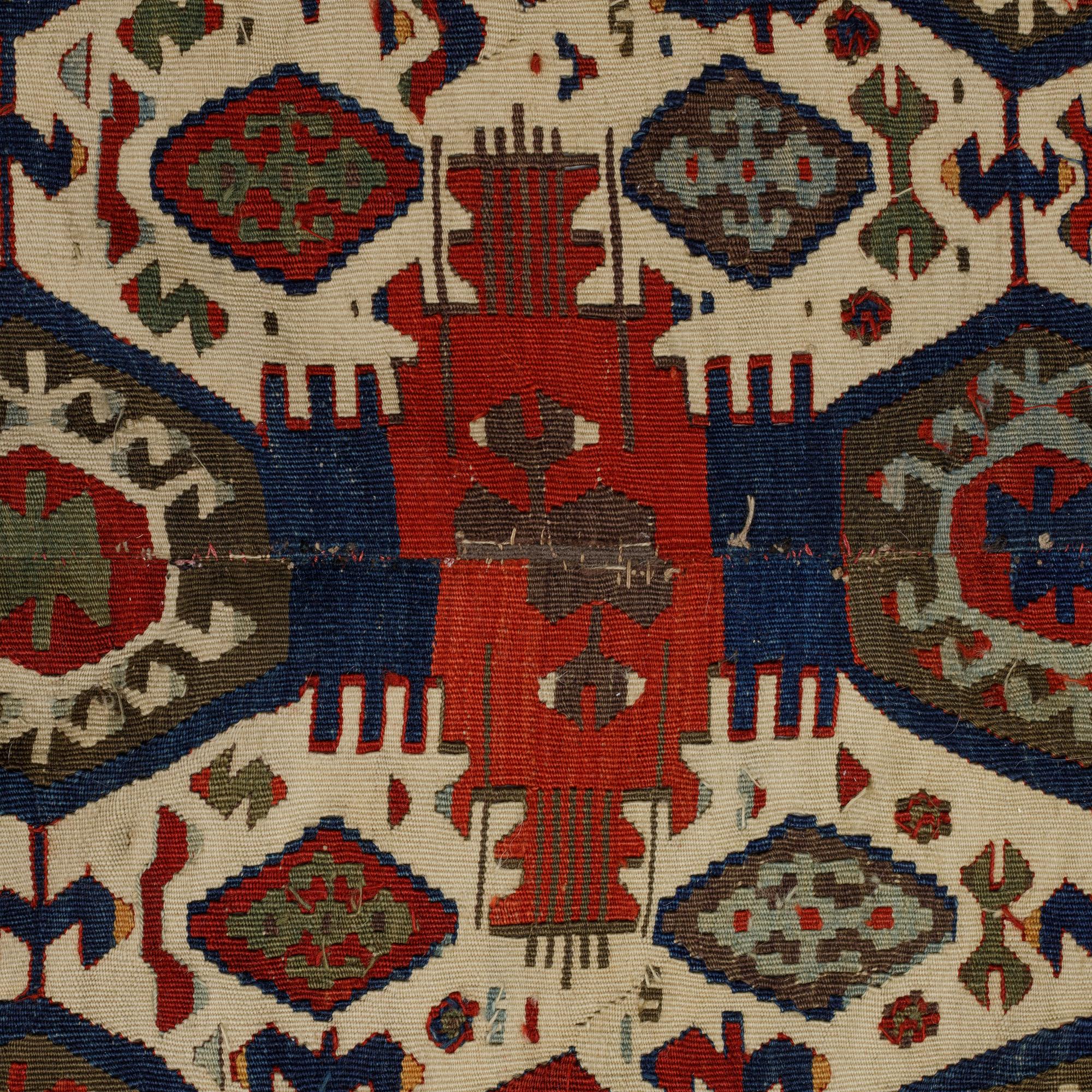 A carpet, a kilim, an antique Anatolian, ca 310-326 x 183,5-192 cm.