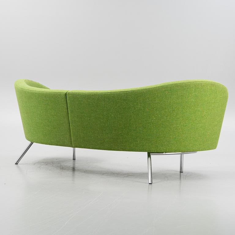 A 'Orgy' sofa with pouf by Karim Rashid for Offecct.