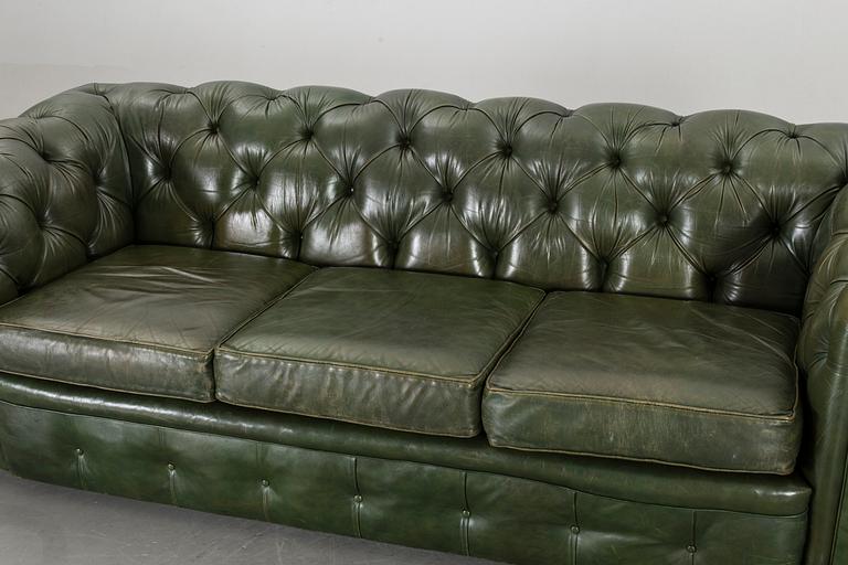 A Pegasus Chesterfield-model sofa and armchair.