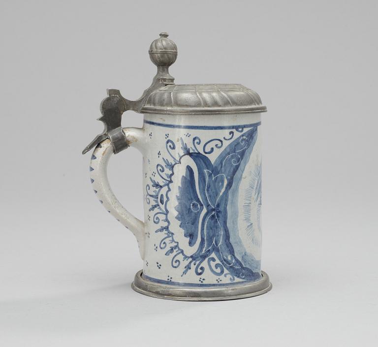 A faience and pewter jug. 18th century.