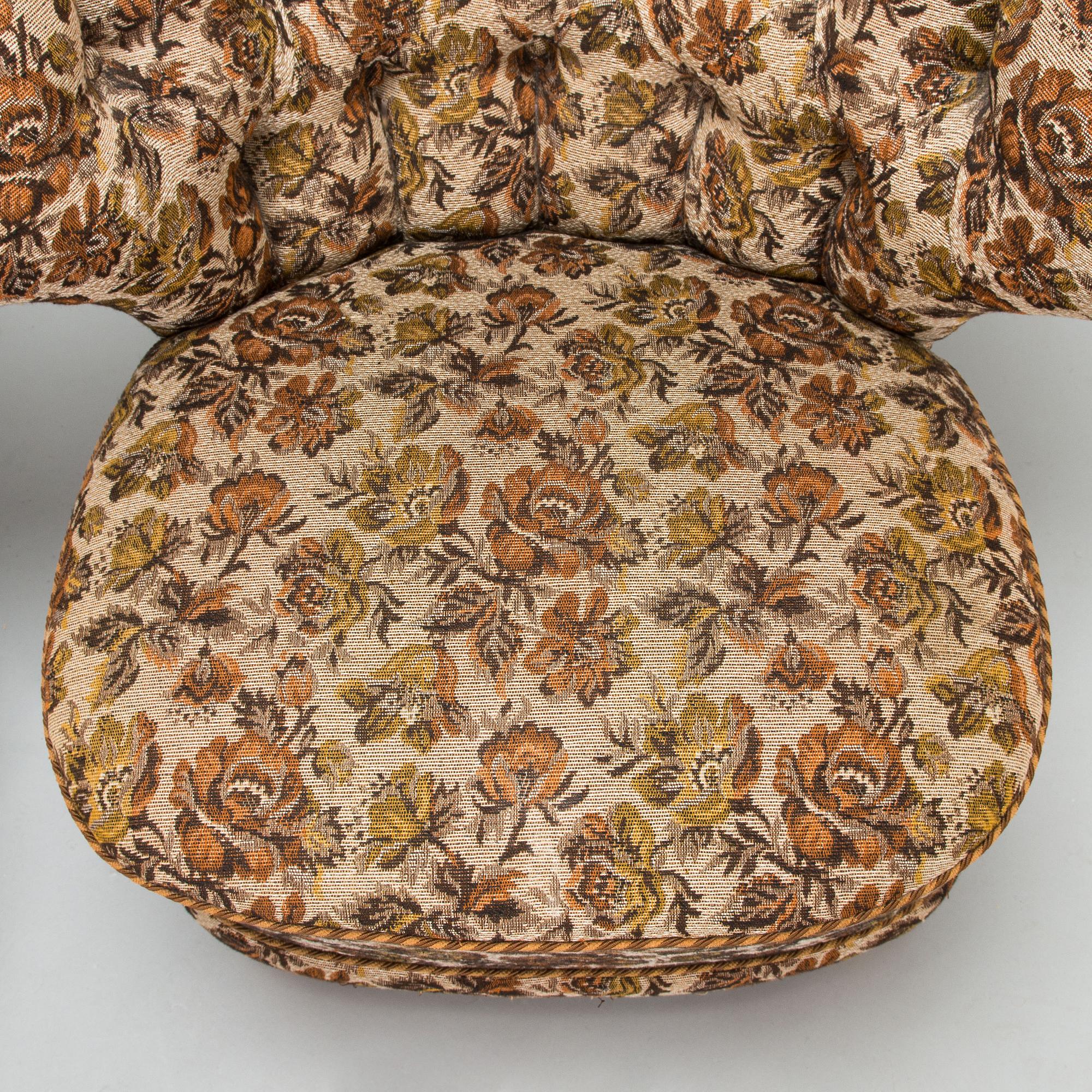A pair of 1950's armchairs.