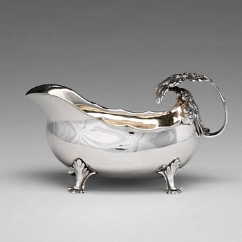 183. A Swedish 18th century parcel-gilt silver cream-jug, mark of Petter Åkerman, Stockholm 1782.