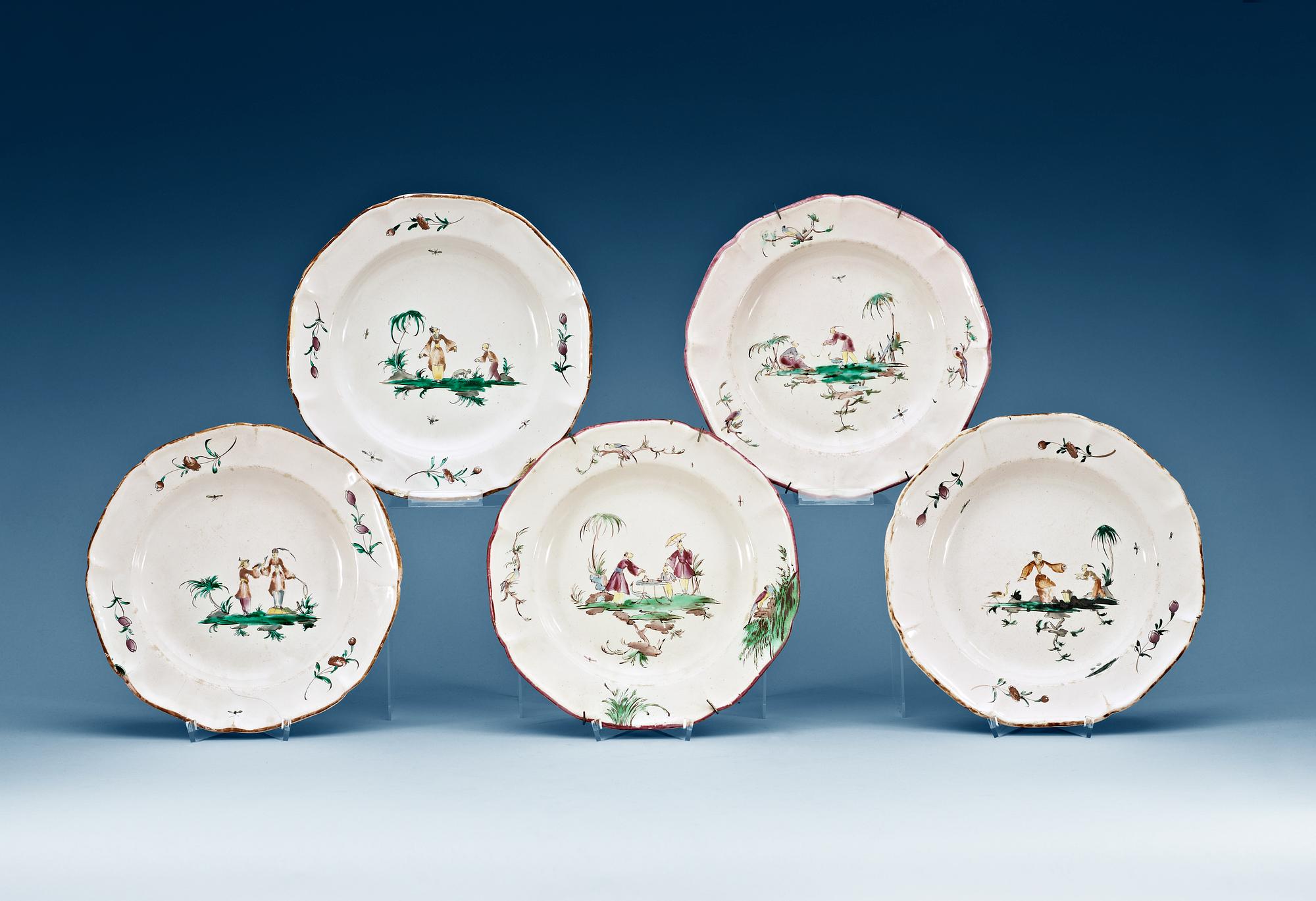 A set of five French faience plates, 18th Century.