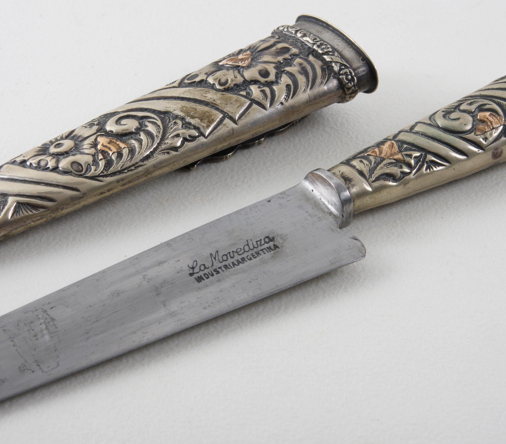 DOLK, delvis försilvrad metall.