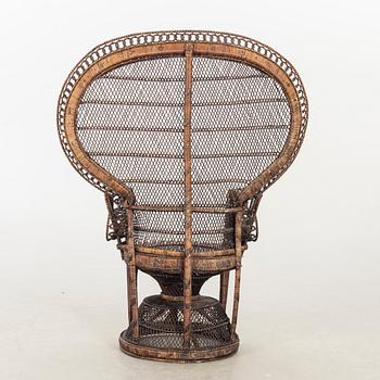 AN RATTAN EASY CHAIR.