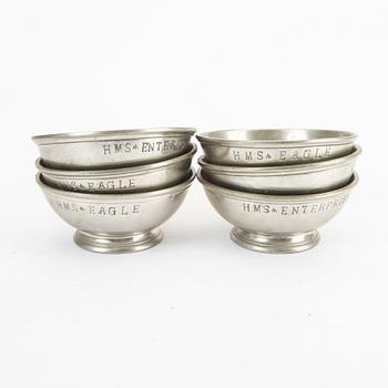 A set of five pewter tankards and six bowls England 20th century.