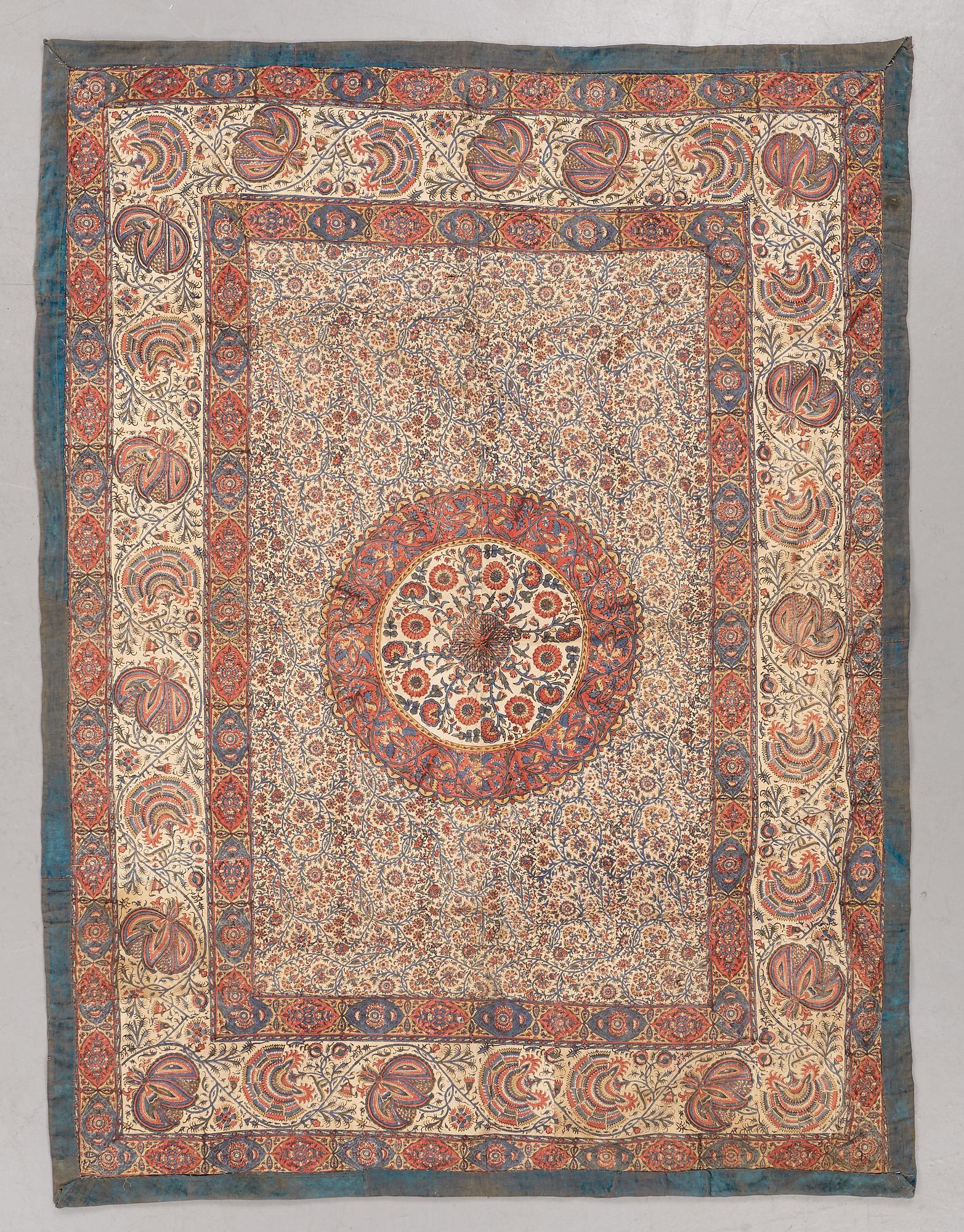 An elephant cover for parades, ca 202 x 151,5 cm, probably India around 1900.