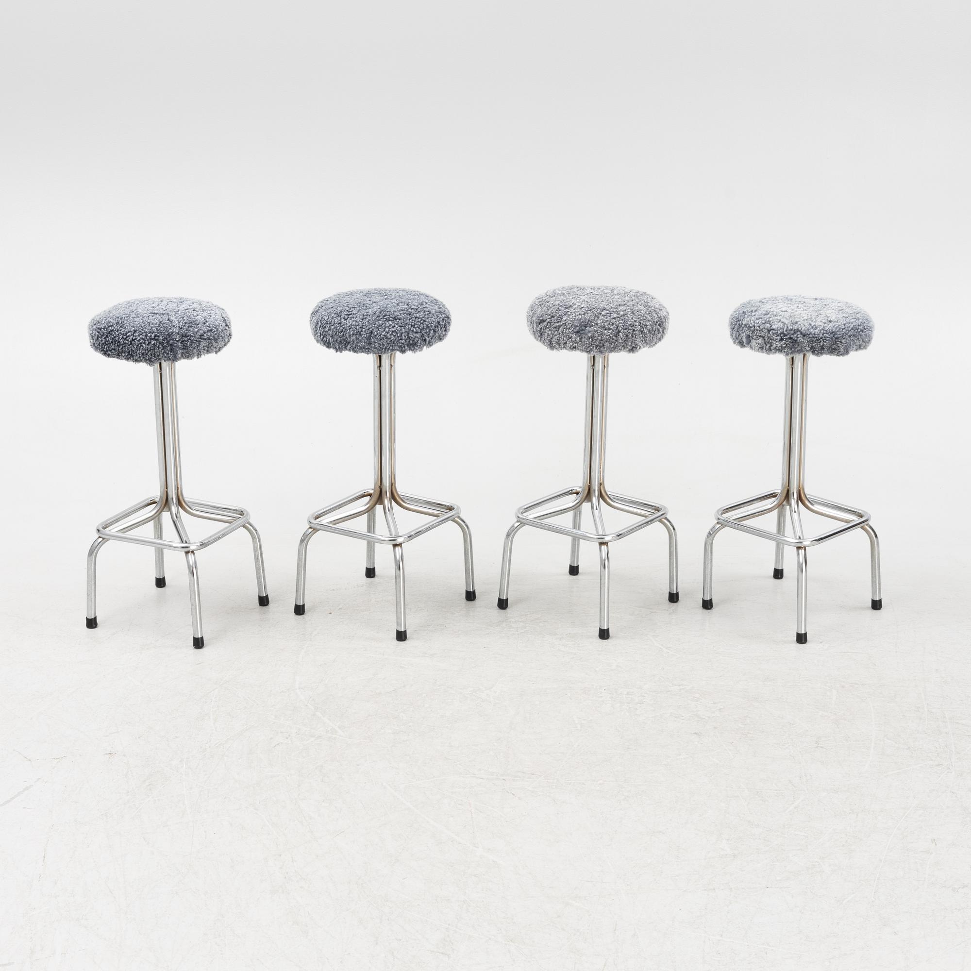 A set of four bar stools, mid 20th Century.