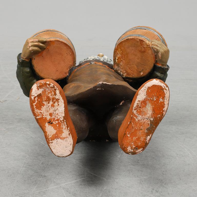 A terracotta gnome, probably Germany.