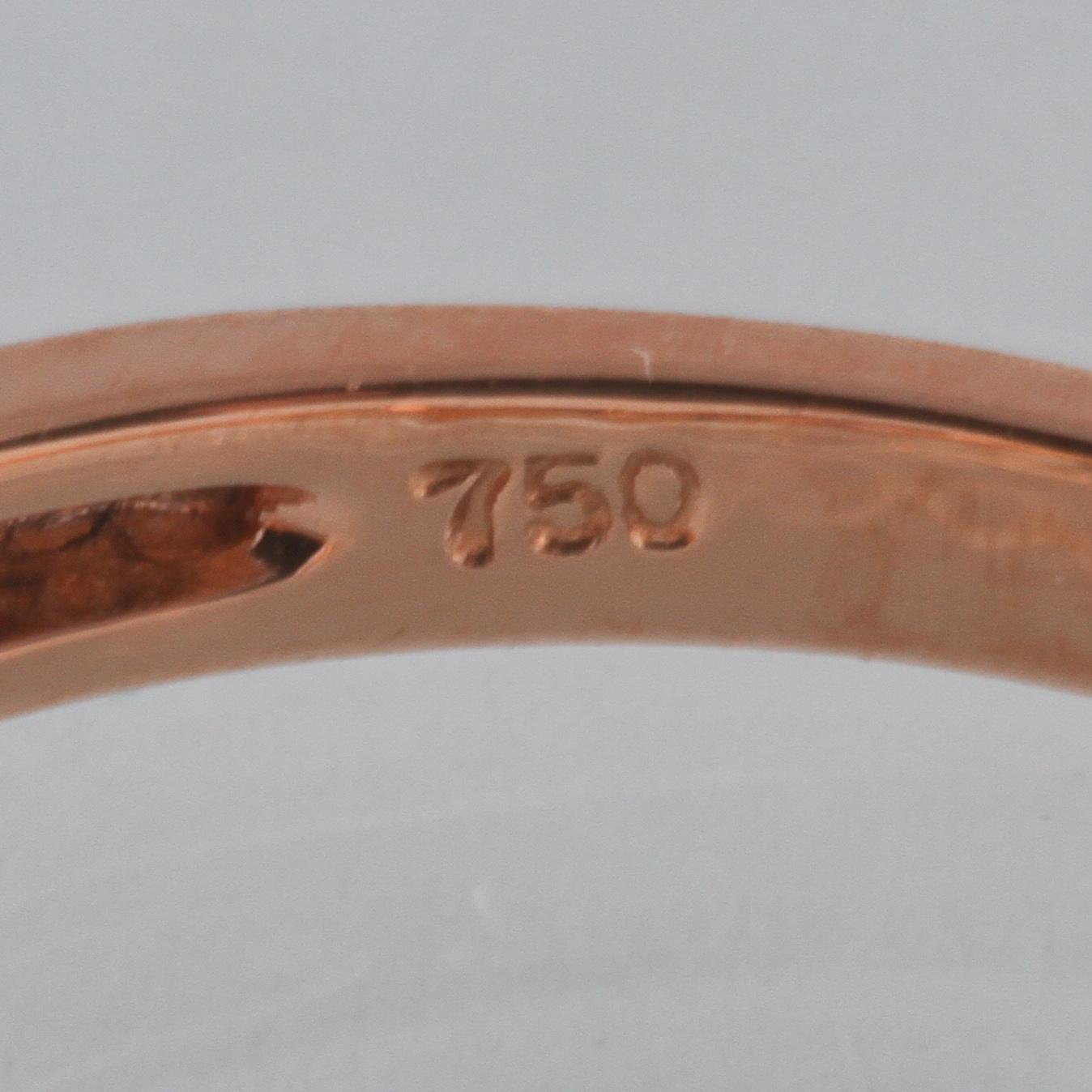 RING, 18K guld med fasettslipad kunzit ca 1.42 ct samt 6 fasettslipade turmaliner ca 1.31 ct. Vikt 3,5 gram.