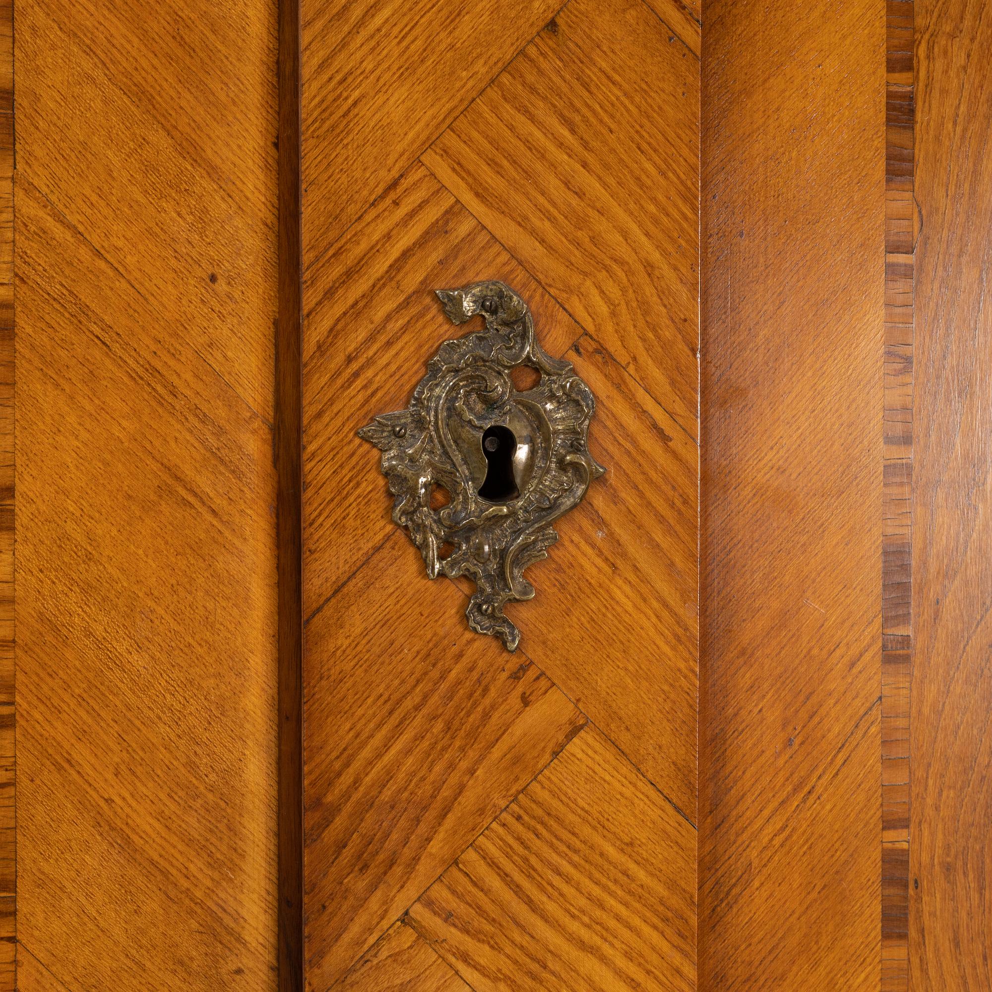 A Swedish rococo cabinet, mid 18th Century.