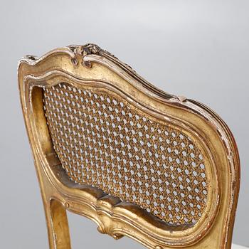 A pair of chairs from the first half of the 20th century.