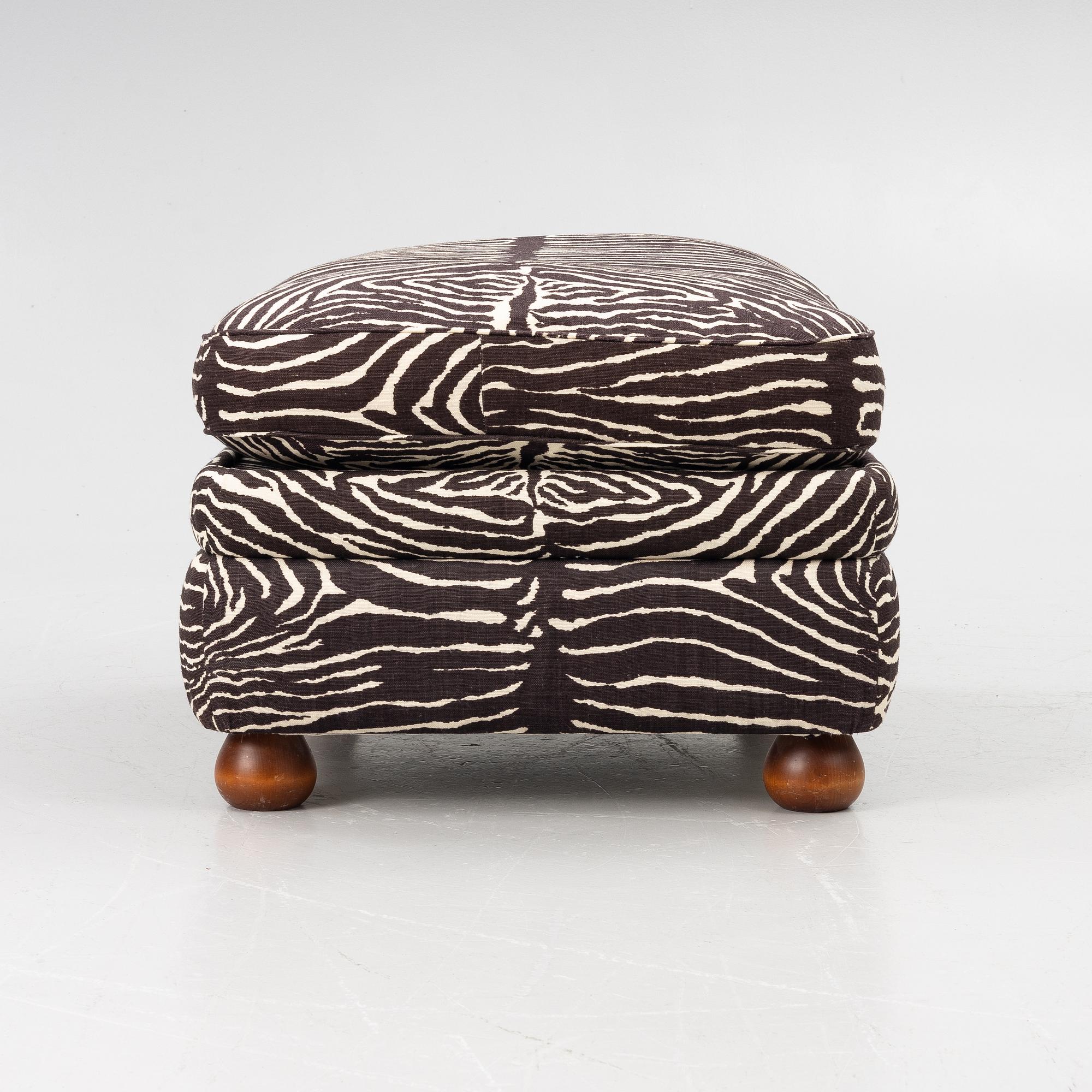 Josef Frank, a model 336 ottoman, Svenskt Tenn.