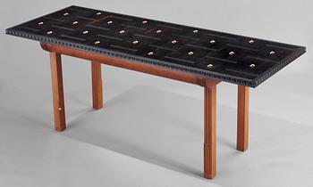 A Hjalmar Jackson ebony and pear wood desk / library table, Stockholm 1934, possibly designed by Oscar Nilsson.