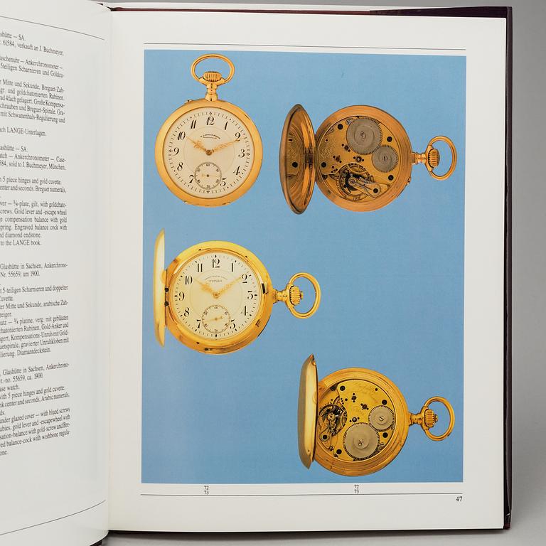 A set of 6 watch books.