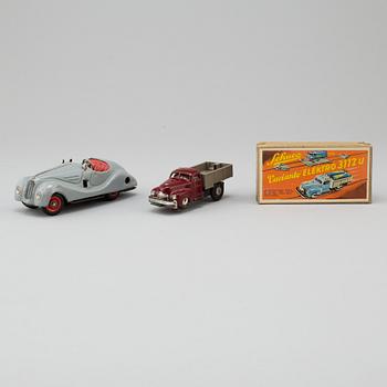 Two 1950s Schuco toy cars, Germany.