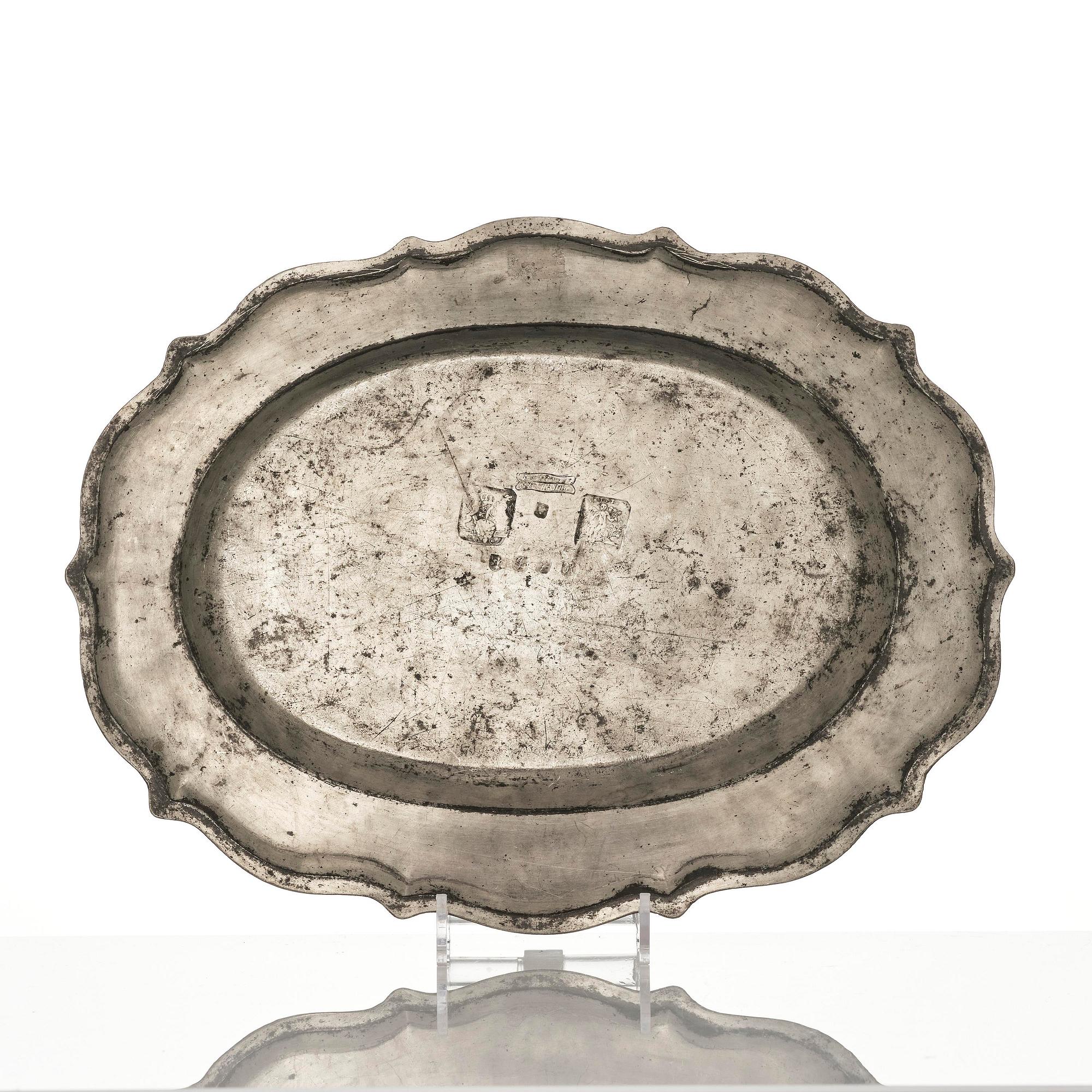 A rococo pewter charger by J. G. Ryman, Stockholm 1768.