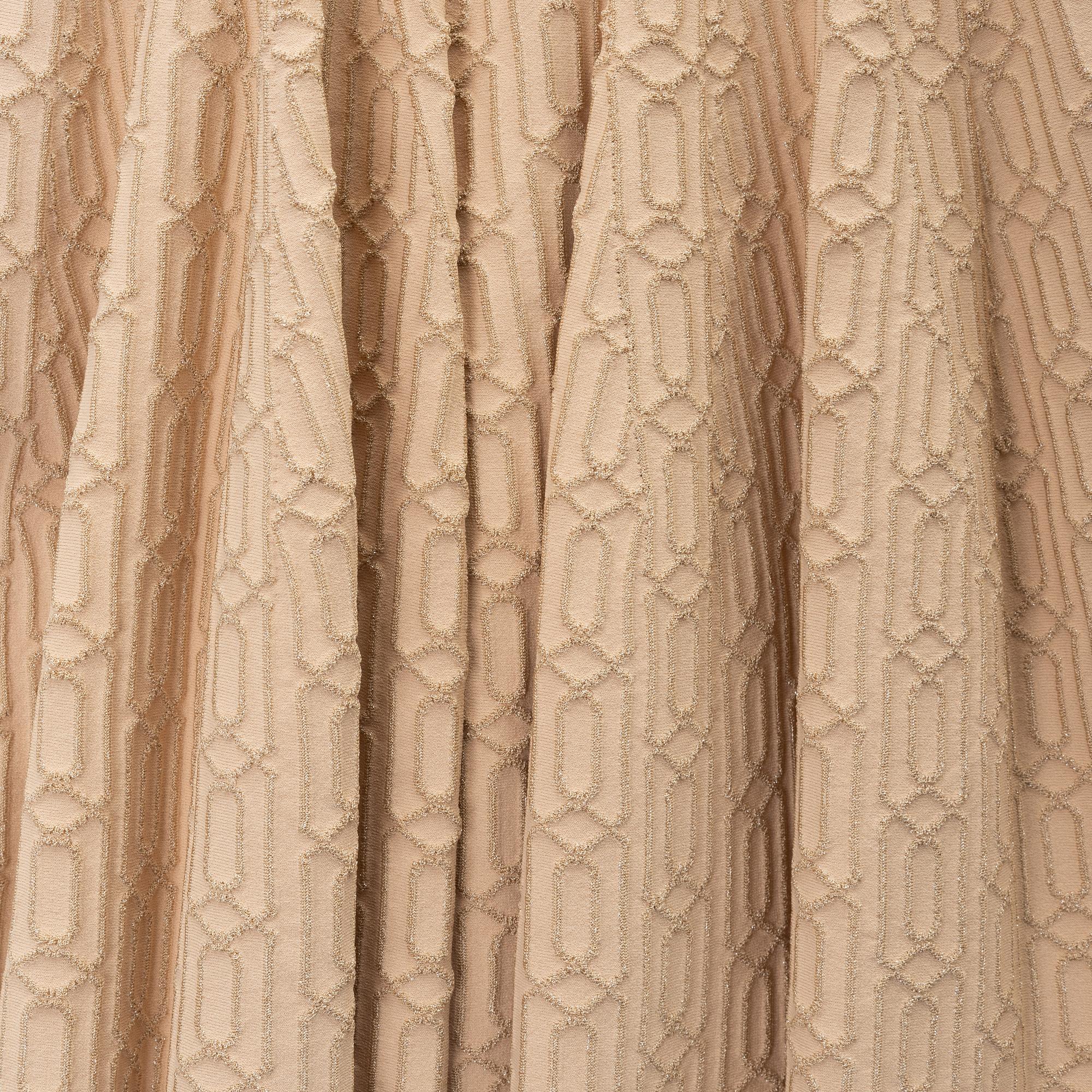 Alaïa, a beige patterned dress, size 36.