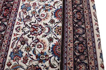 A Nain carpet, part silk, c. 294 x 201 cm.