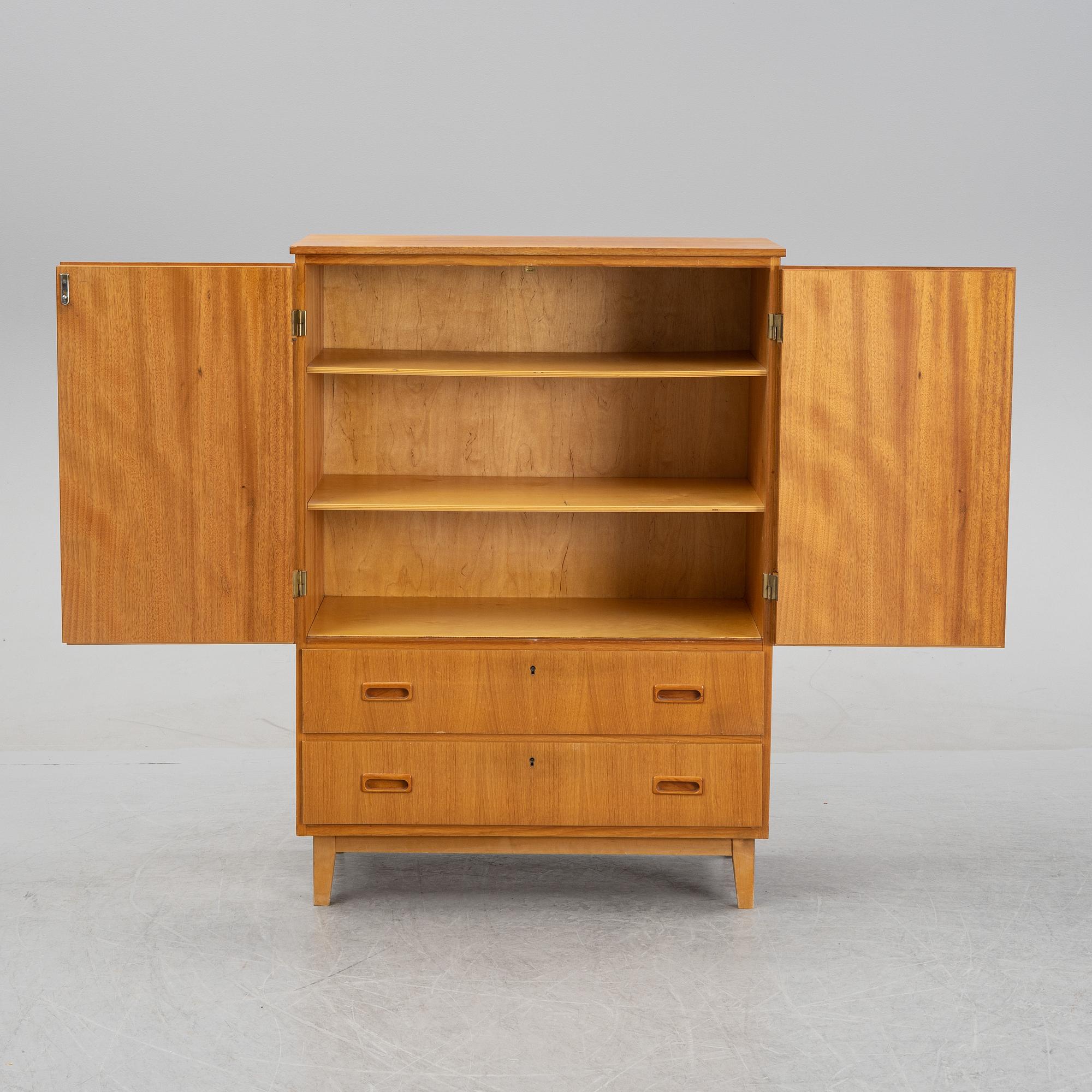 A 1950's/60's teak cabinet.