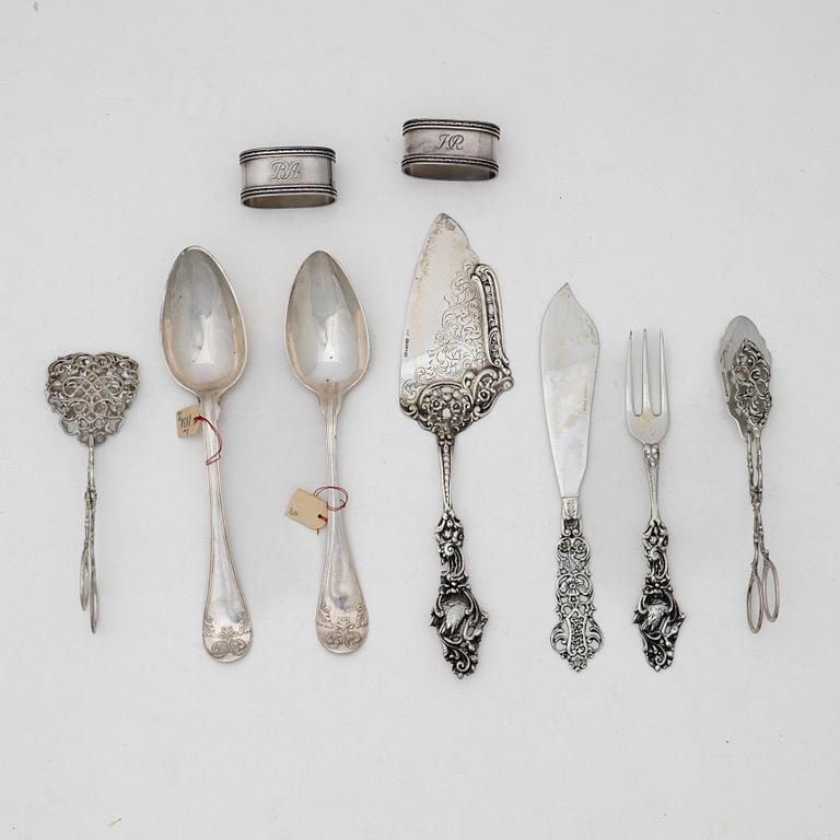 Bestick och servettringar, 9 delar, silver, bl a Gewe Silvervarufabriken Ab, Malmö 1952.
