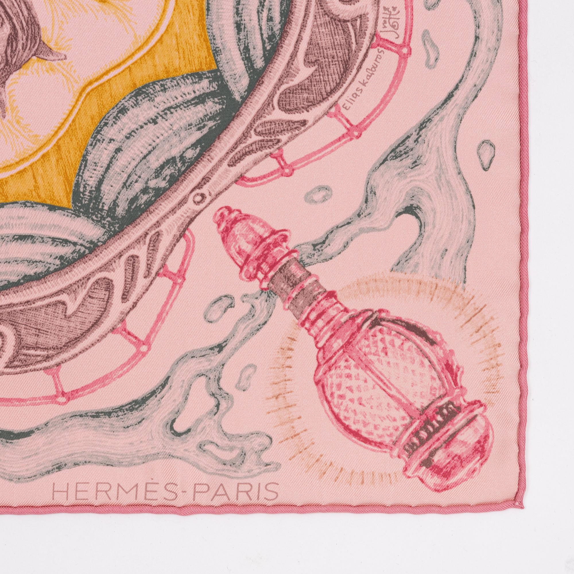 Hermès, a 'Horscars' silk scarf.