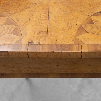 An inlay table, 19th Century.