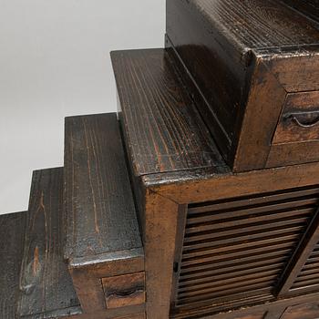 A Japanese chest of drawers / cabinet so-called "Step Tansu" in cedar wood, 19th century.