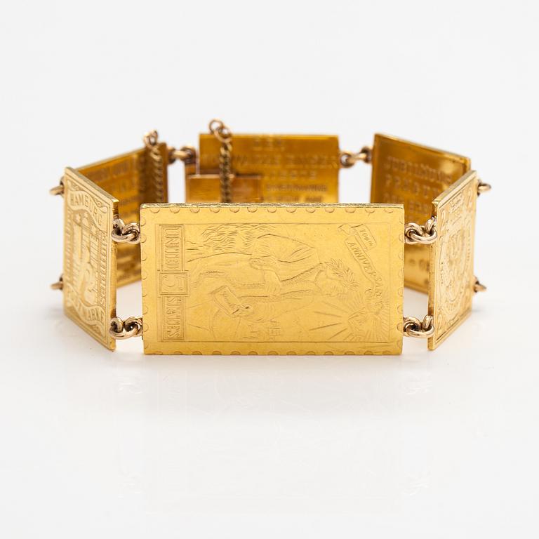A bracelet with post stamps made of 900 gold..