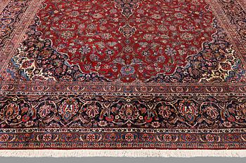 A semi-antique Keshan carpet, signed, 449 x 317 cm.