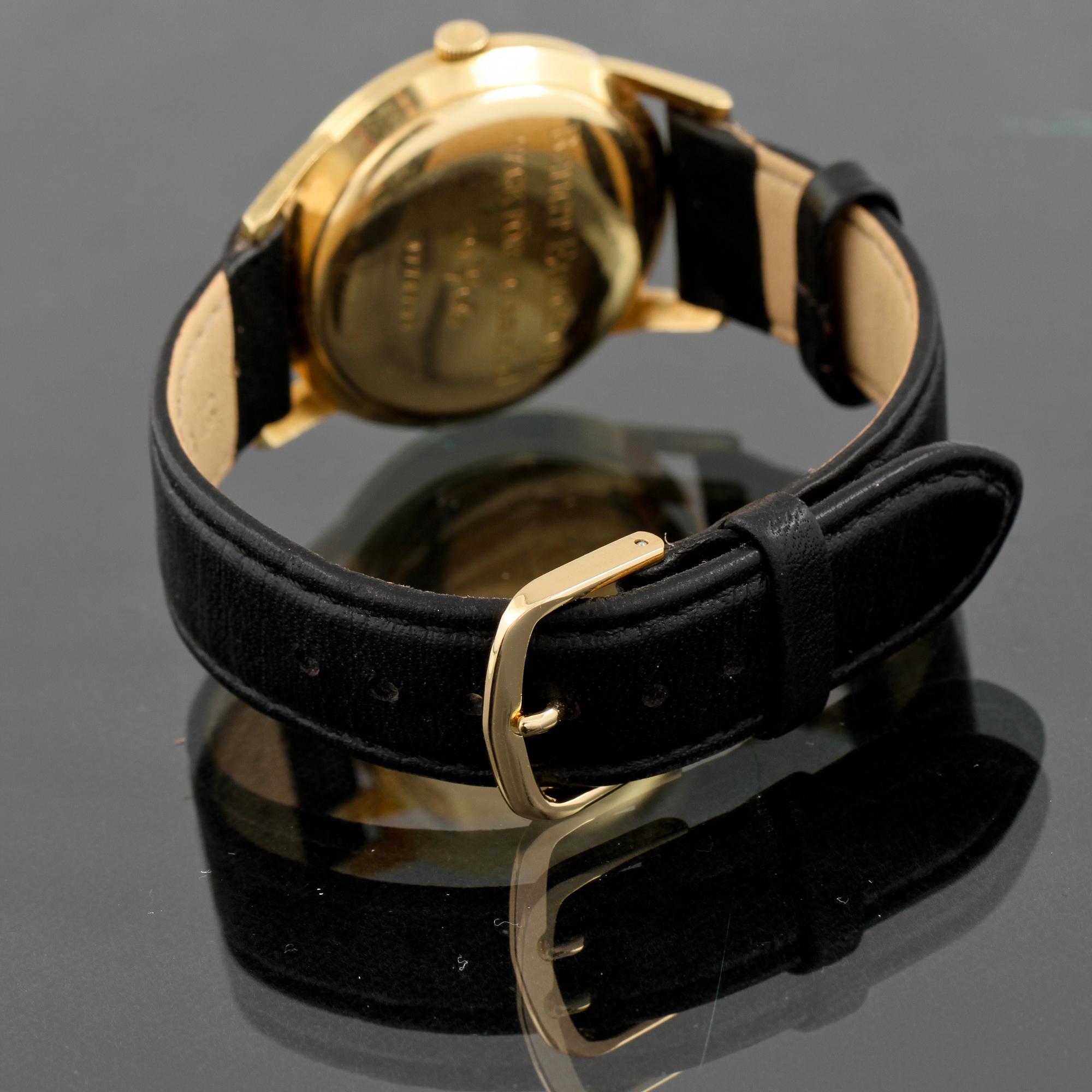 ARMBANDSUR, herr, 18 k guld, Zenith, 1900-talets andra hälft. Total vikt 37 g.