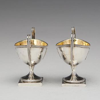 A pair of Swedish late Gustavian parcel-gilt silver salt-cellars, mark of JJ Ulfsberg, Nykoping (1793-1824(-25)).