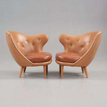 Arne Norell, A pair of Arne Norell 'Tummen/ The Thumb' easy chairs, Gösta Westerbergs Möbler, Stockholm 1950's.
