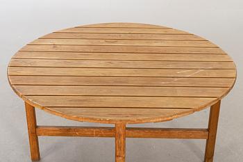 A circular garden table, probably Elsa Stackelberg for Fri Form.