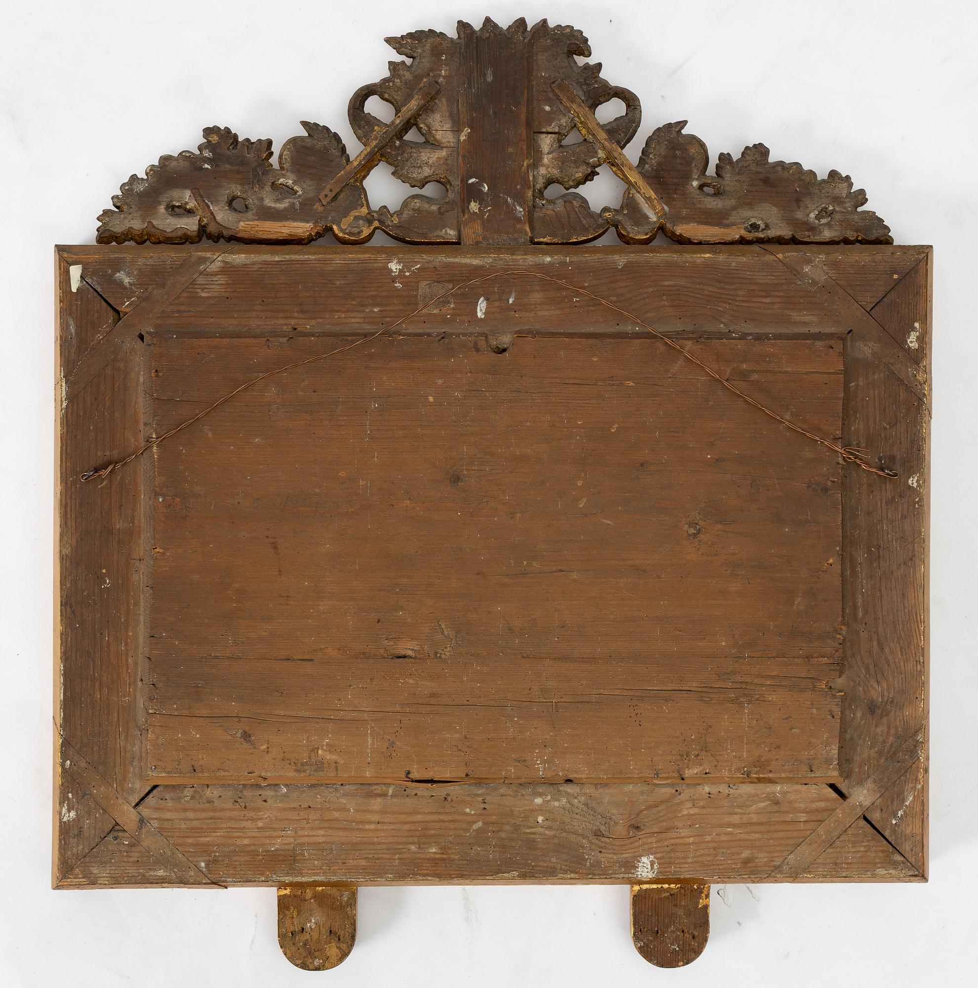 A pair of Late Empire gilded mirror sconces for two candles, Gothenburg, 1830s-40s.