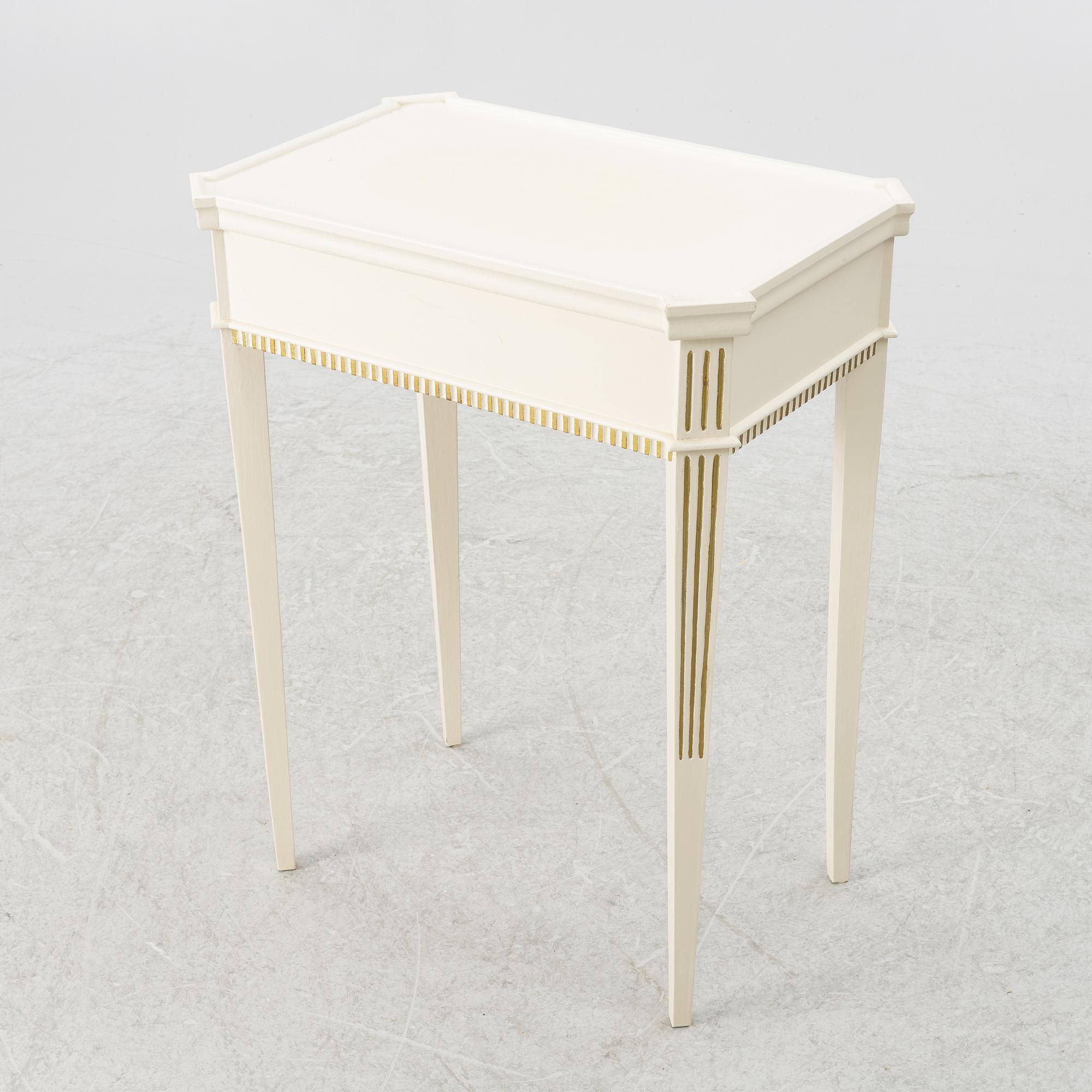 A Gustavian style side table, early 20th century.