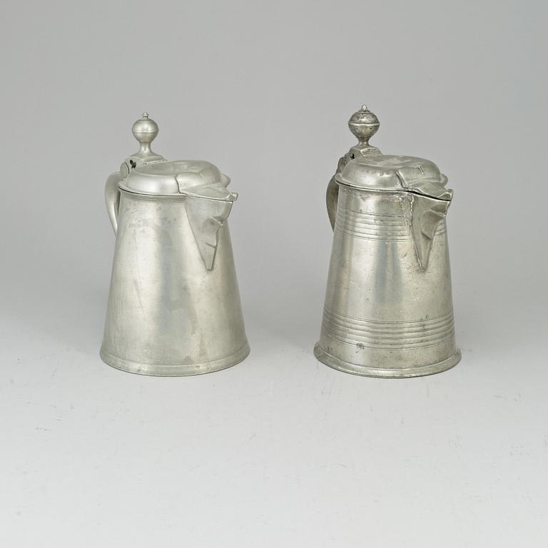 Two pewter tankards, one by Carl Petter Eckerström, Västerås 1833.