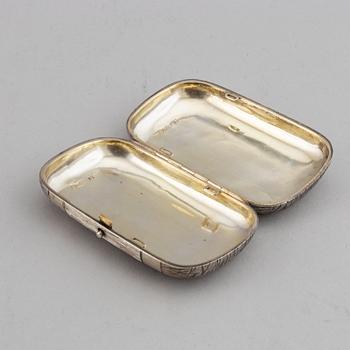 A Russian silver cigarette-case, marked EB, 1883.