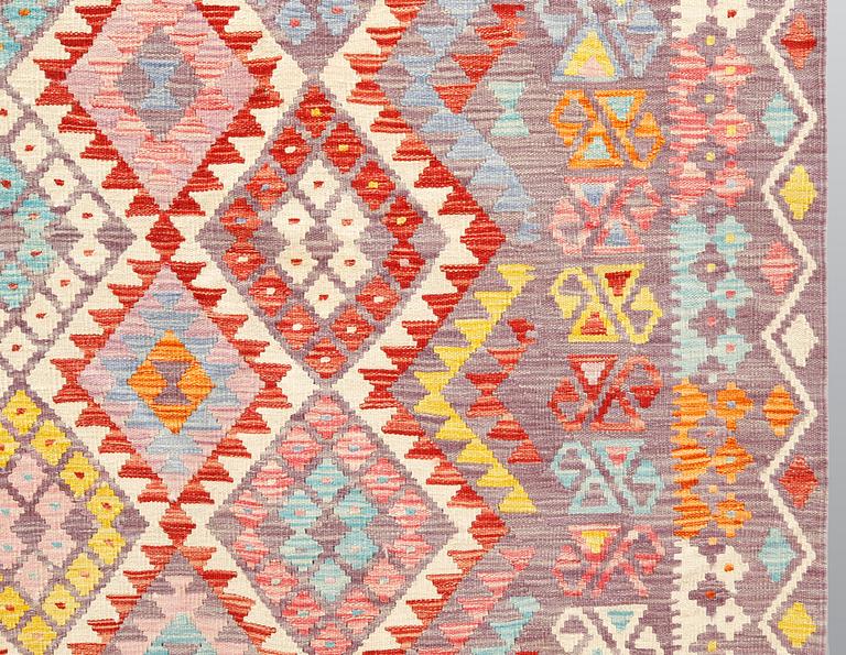 A kilim carpet ca 338 x 256 cm.